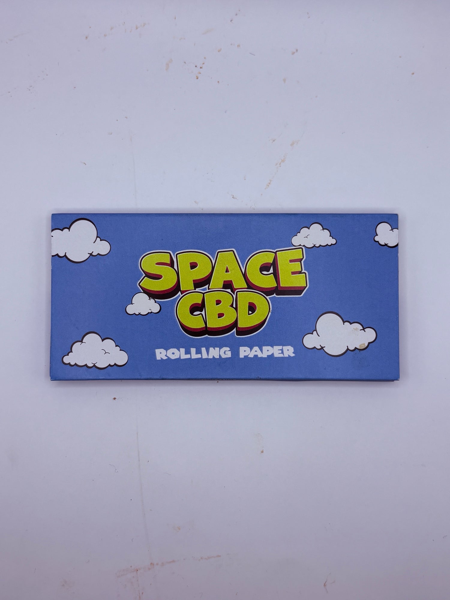 Carnet de feuilles à rouler Space CBD Rolling Paper, couverture bleu ciel et nuages